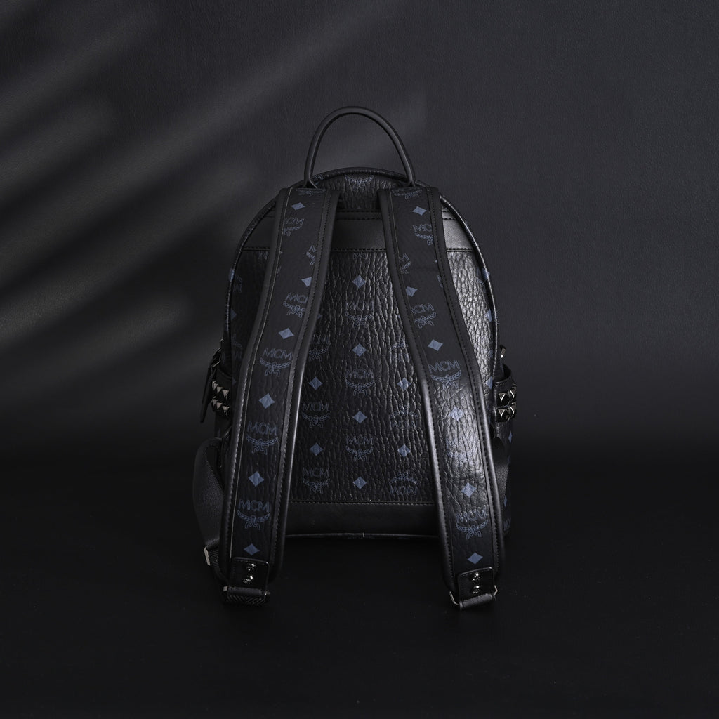 MCM Stark Visetos Medium Backpack – Black Monogram with Studded Detailing